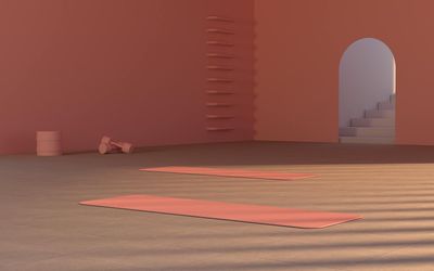 Yoga mat and blocks arranged neatly